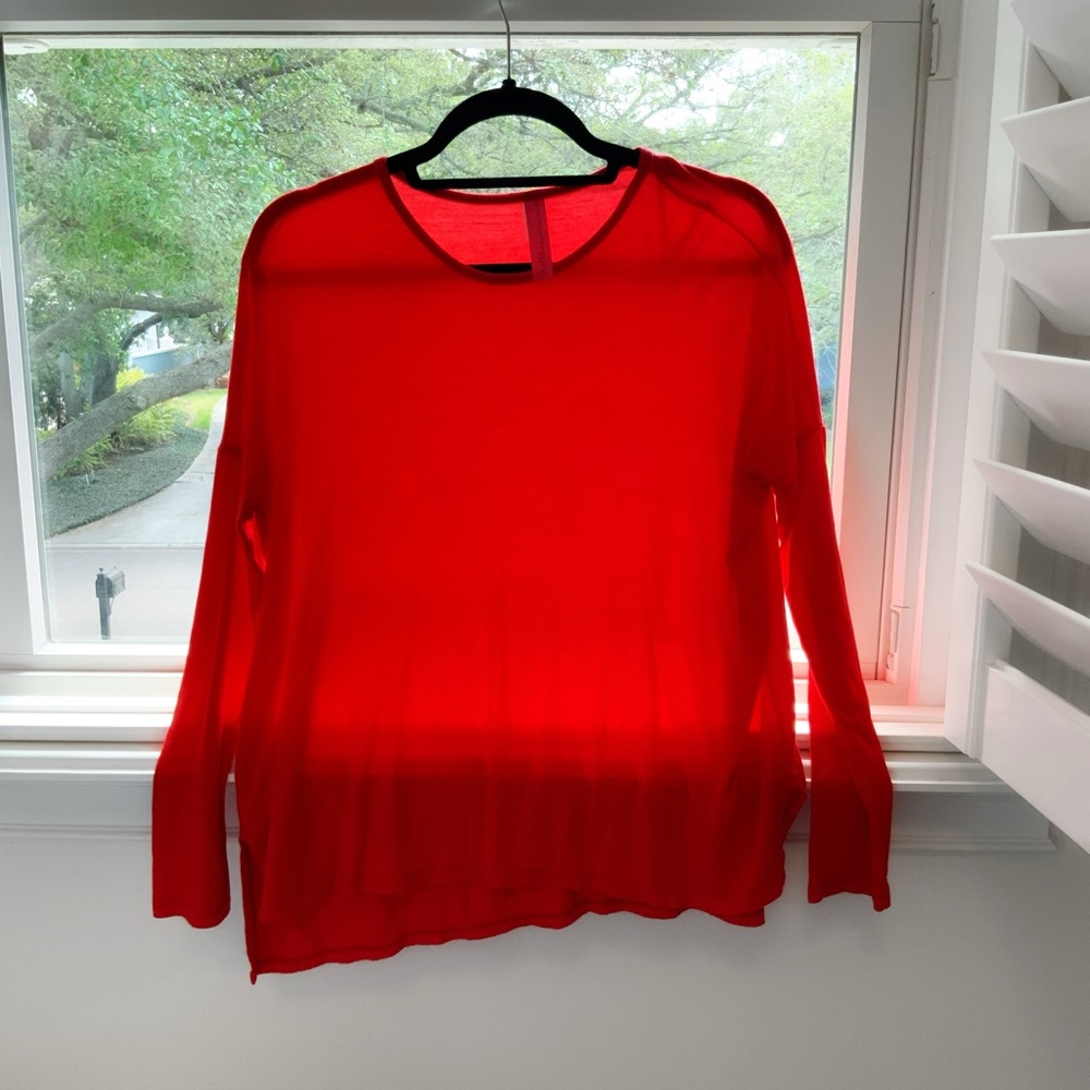 Long red sleeved shirt